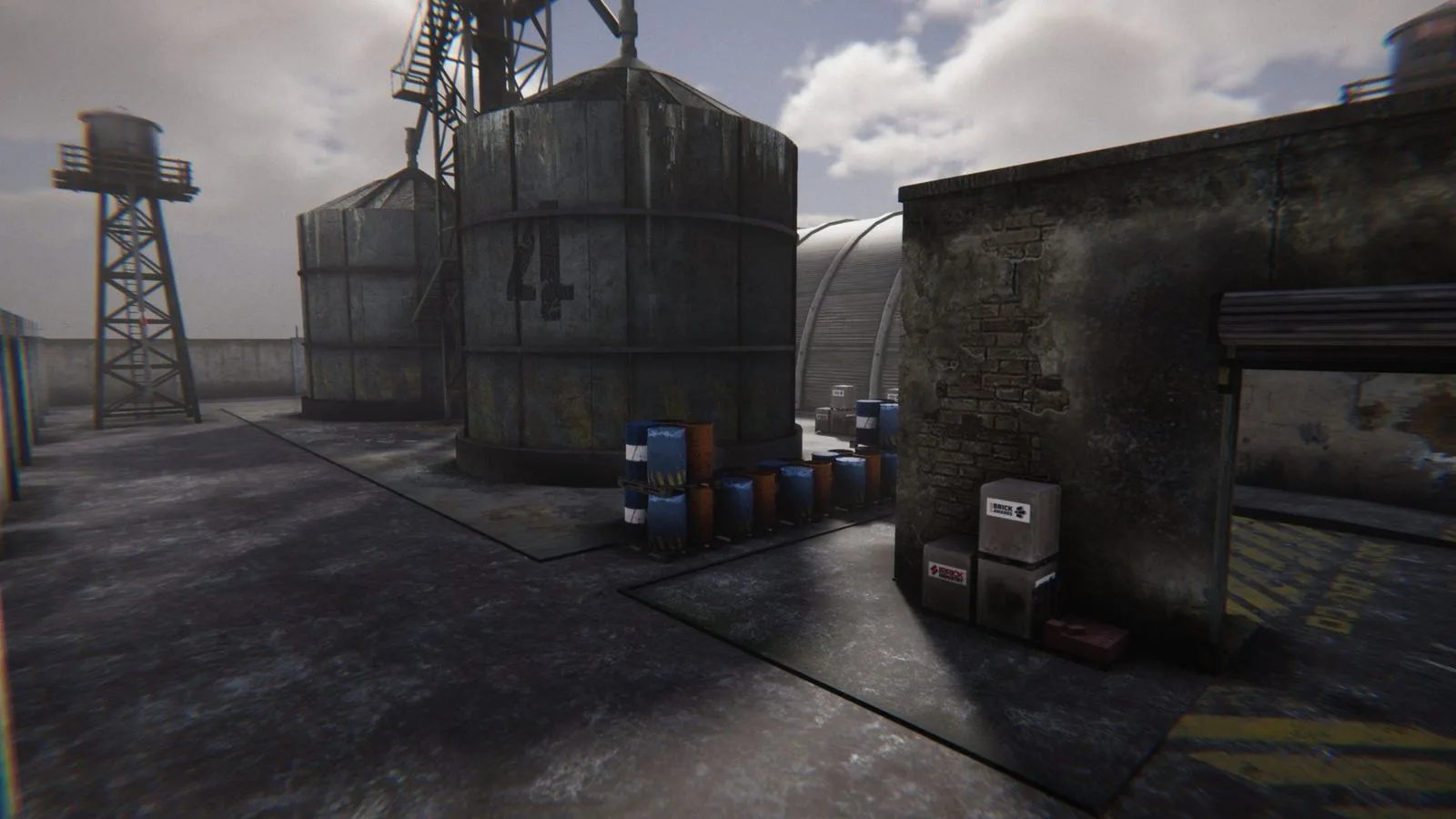 Overcast yard with storage tanks